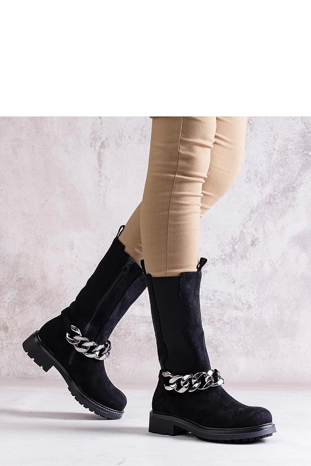 Bottes à talons Solea cuir noir chaîne métal hauteur genou zip latéral confort port semelle caoutchouc élégance moderne femmes
