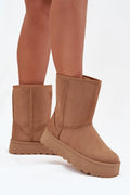 bottes neige femme mi mollet suédine camel doublure fourrure fausse épaisse semelle plateforme crantée caoutchouc antidérapante bout rond coutures apparentes