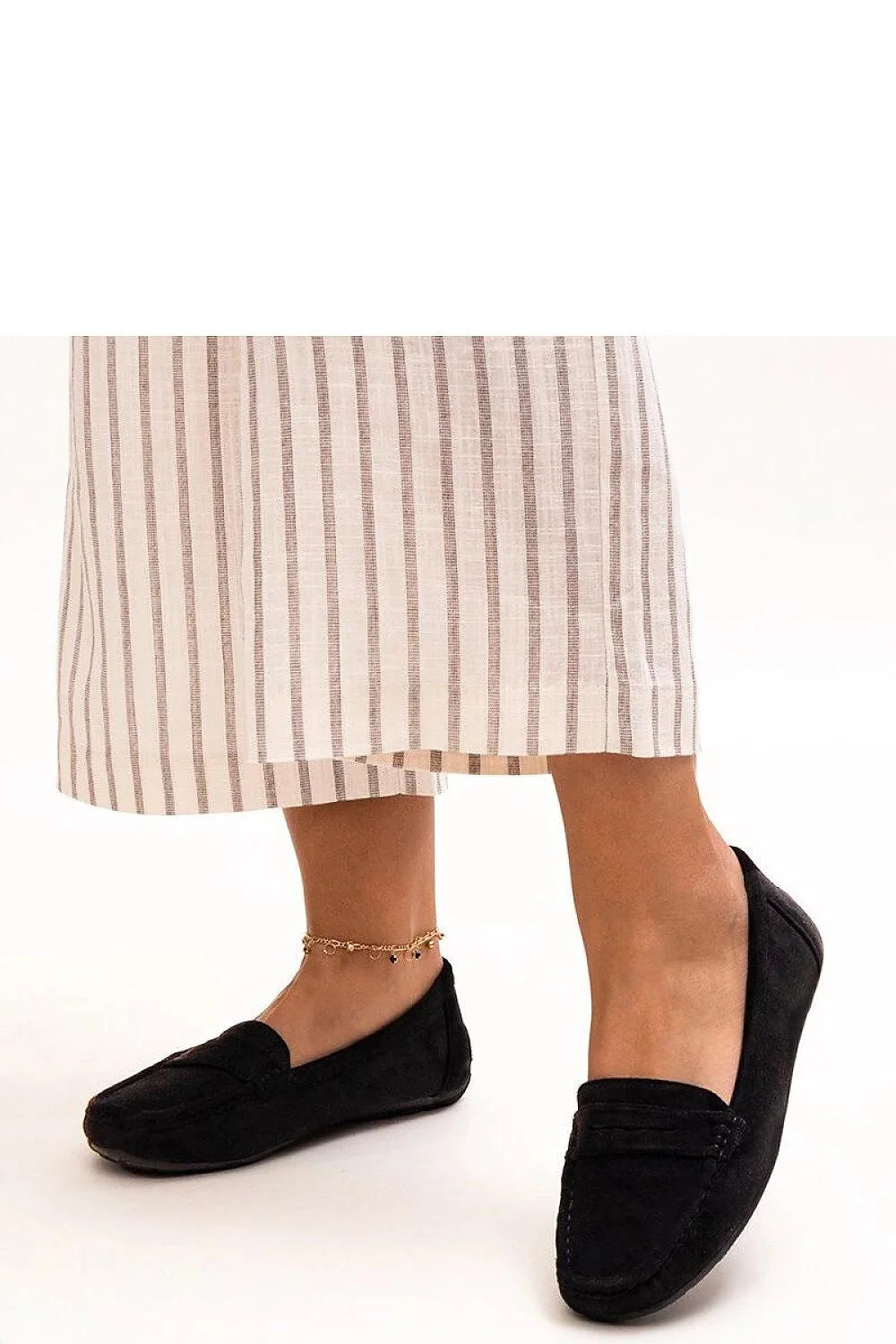 Moccasins classiques femmes élégance intemporelle design minimaliste cuir noir confort semelle caoutchouc occasion quotidienne