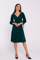Robe de jour élégante vert émeraude portefeuille décolleté V manches longues élastiques nœuds décoratifs taille ajustable femme