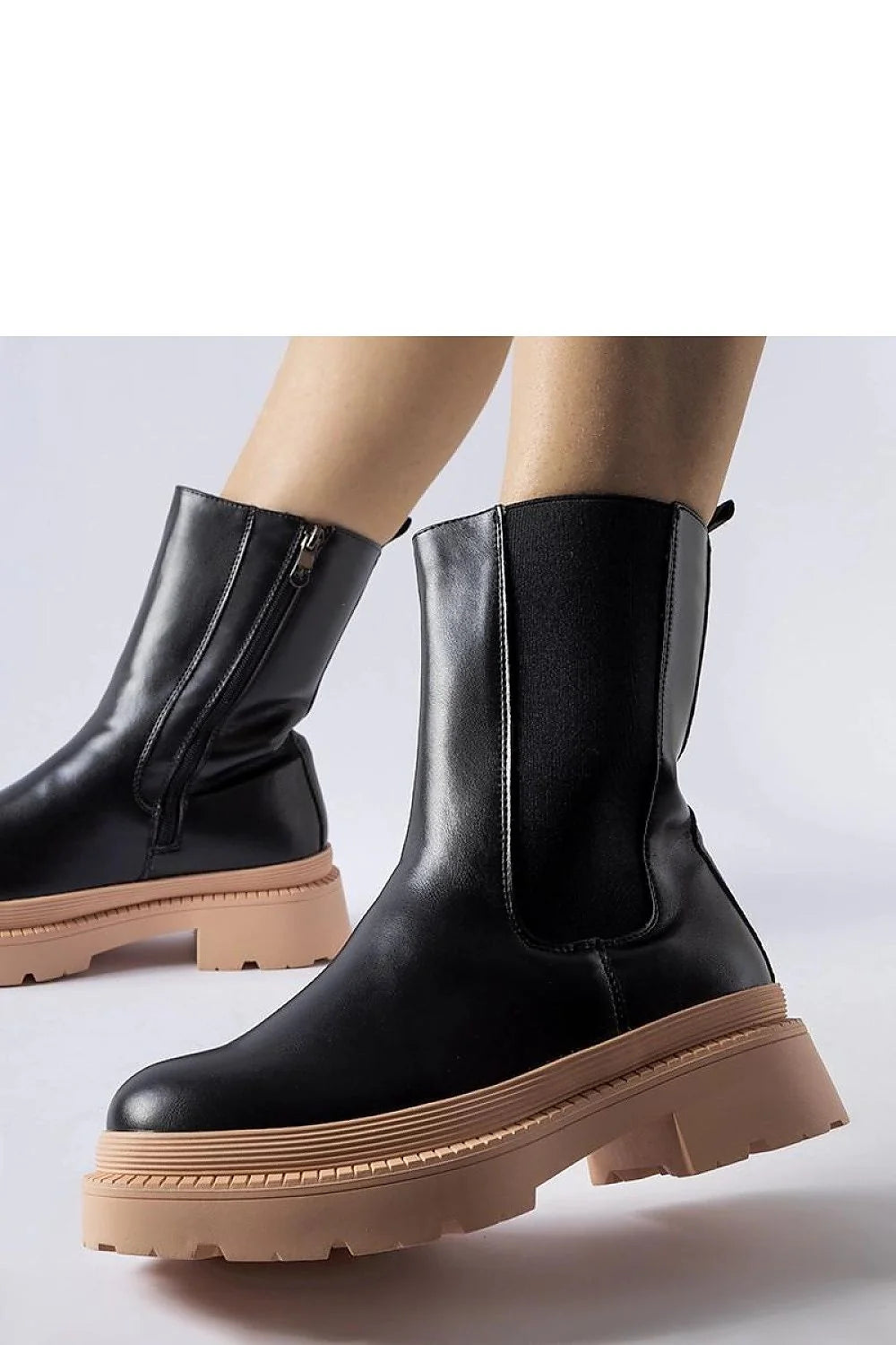 bottes femme mi mollet cuir synthétique noir semelle beige clair plateforme crantée bout arrondi fermeture éclair intérieure empiècement élastique latéral