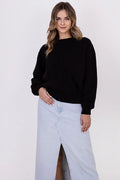 Pull et jupe femme mode classique texture torsadée couleur noir et bleu longueur totale coupe ample fente frontale