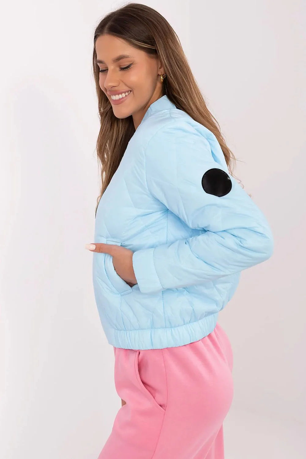 Veste bomber féminine élégante en polyester rembourré bleu pastel sans capuche fermeture éclair élastique poignets saison transition femme