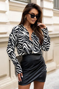 Chemise femme manches longues motifs zébrés noir blanc élégante mode visage soyeux coupe classique fermeture boutonnée