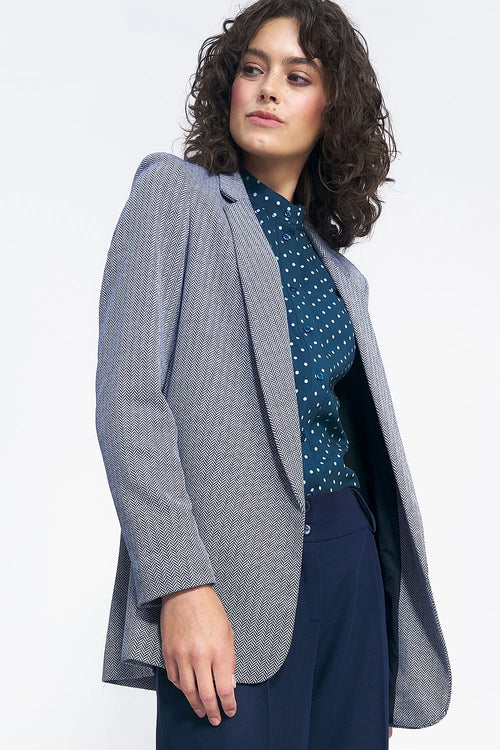 blazer femme chevrons bleu marine blanc col tailleur épaules structurées coupe droite longueur hanches manches longues tissu texturé mélange tissé