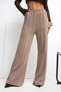 pantalon survetement femme palazzo taille haute coupe large jambe longue plis verticaux poches laterales ceinture elastique doux soyeux
