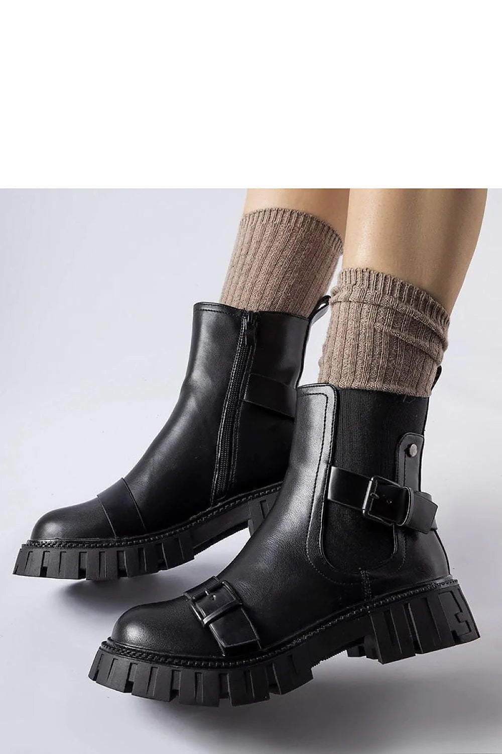 Bottines noires design moderne cuir talons confortables semelle épaisse cheville ajustable femme style robuste