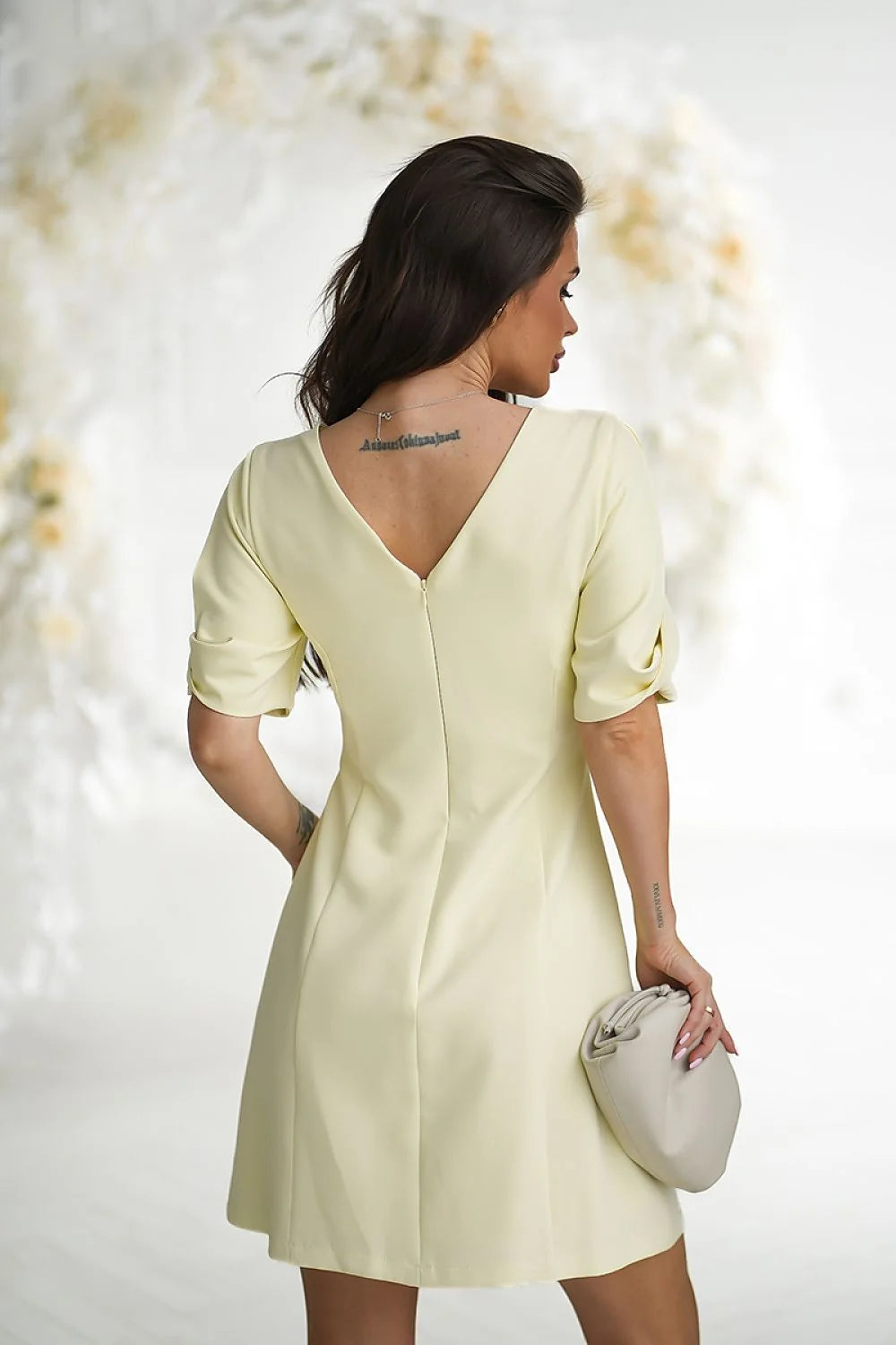 Robe cocktail élégante coupe A-line manches courtes teinte rose poudré doublure confortable fermeture éclair cachée polyester elasthanne femme
