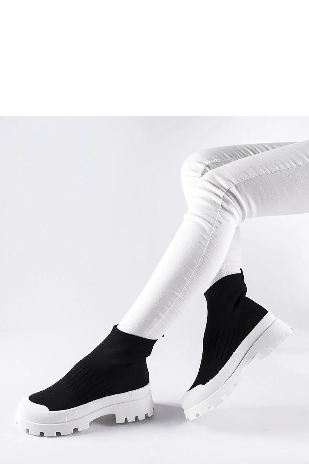 Bottines pour femmes modernes design contemporain noir et blanc tige élastique semelle épaisse sans lacets