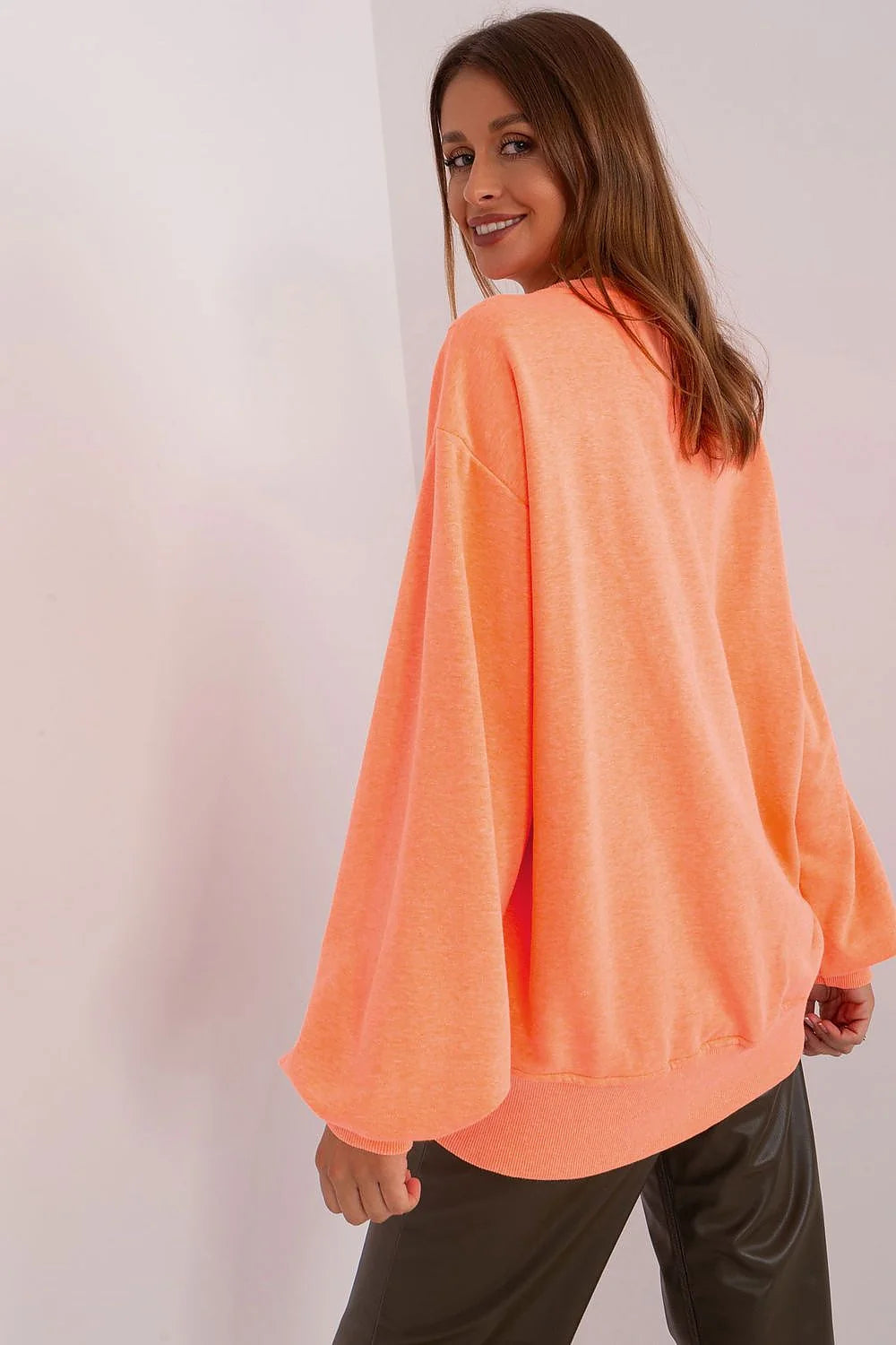 sweatshirt femme oversize col rond coupe loose manches ballon ourlet poignets cotelés coutures structurantes orange chiné molleton doux coton polyester