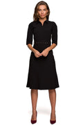 robe élégante noire chemisier midi manches mi longues col chemise cintrée taille haute ceinture intégrée boucle rectangulaire œillets