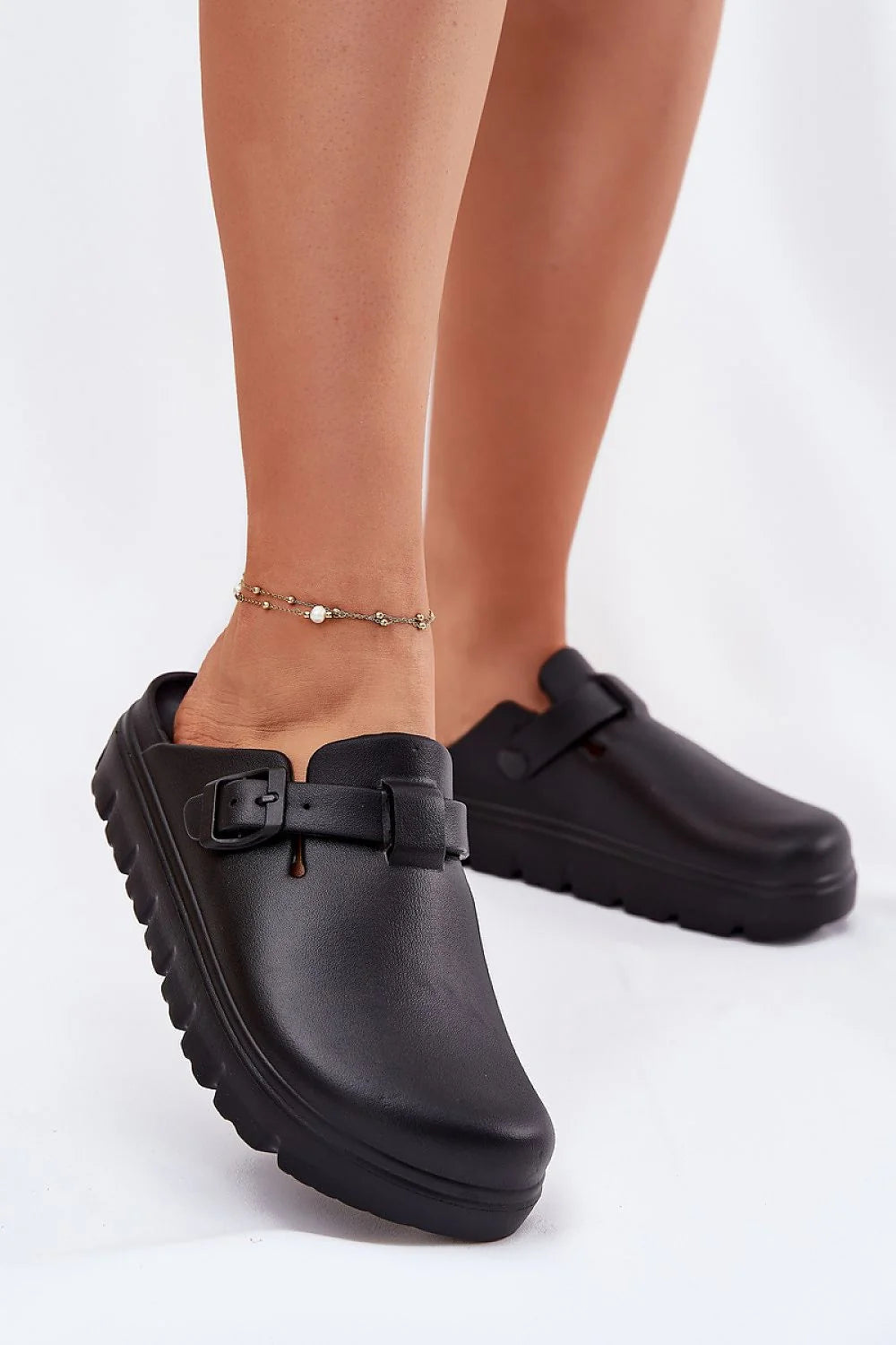 Mules modernes pour femmes style minimaliste semelle épaisse couleur noire matériau caoutchouc confort tout le jour