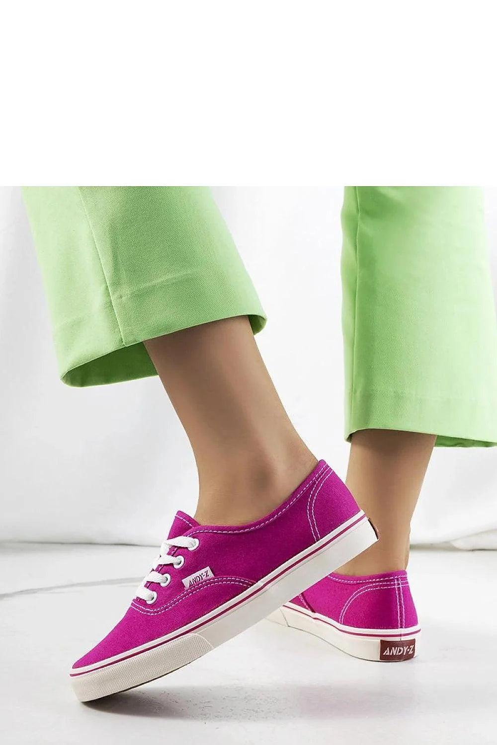 Baskets Solea femmes style décontracté rose vif tissu respirant semelle caoutchouc antidérapante lacets blancs logo discret