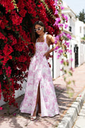 Robe estivale longue La Balancia bretelles larges motif floral blanc rose dos nu fente avant femme