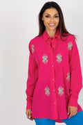 chemise femme oversize rose vif brodée yeux bleus rayons dorés manches longues amples col classique boutonnée fluide légère respirante