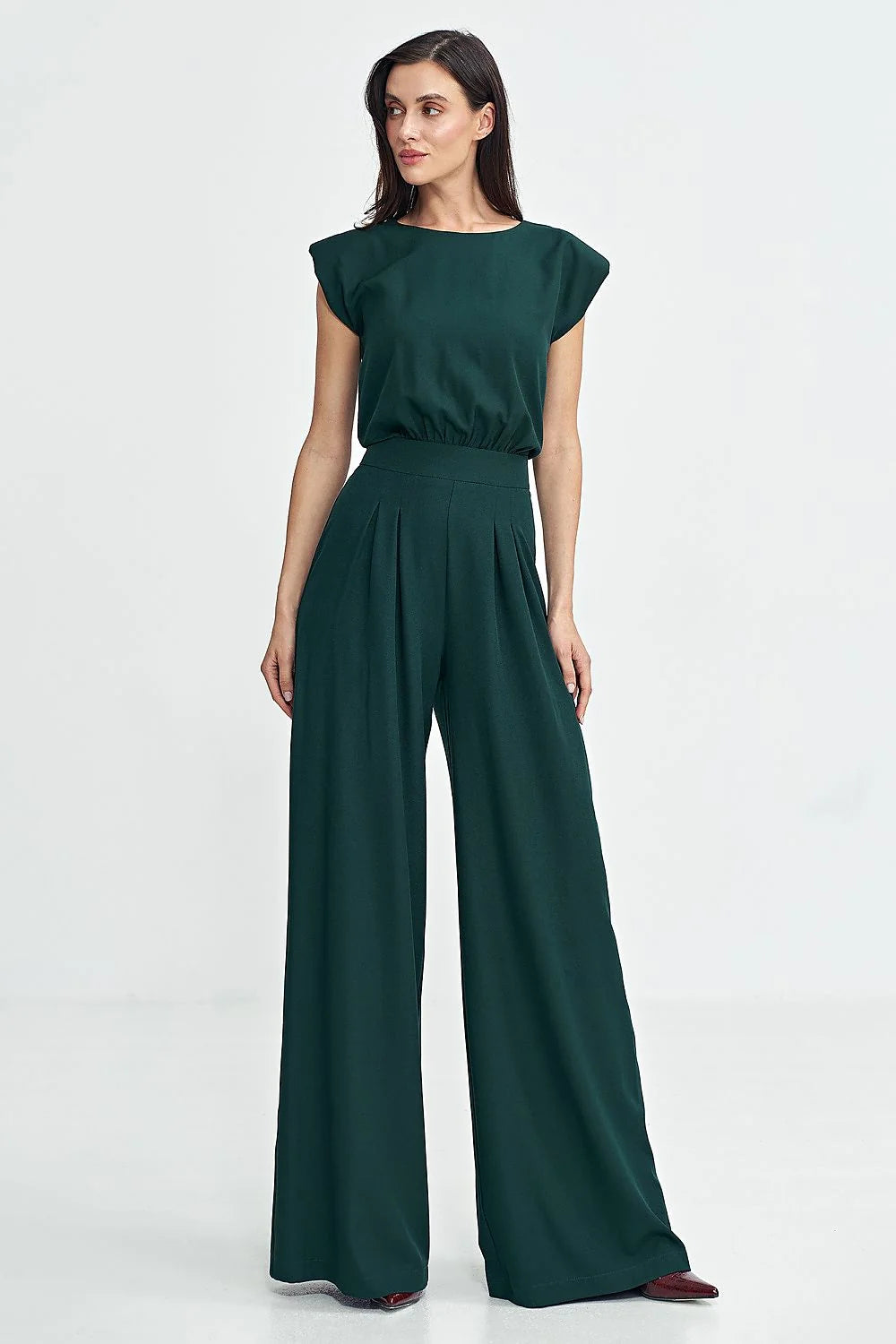 Combinaison pour femme élégante moderne design coupe ample jambes évasées vert profond matériau fluide occasion professionnelle soirées
