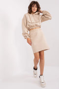 ensemble sweat crop molletonné beige capuche cordons poche rabat manches bouffantes jupe droite courte taille haute élastiquée