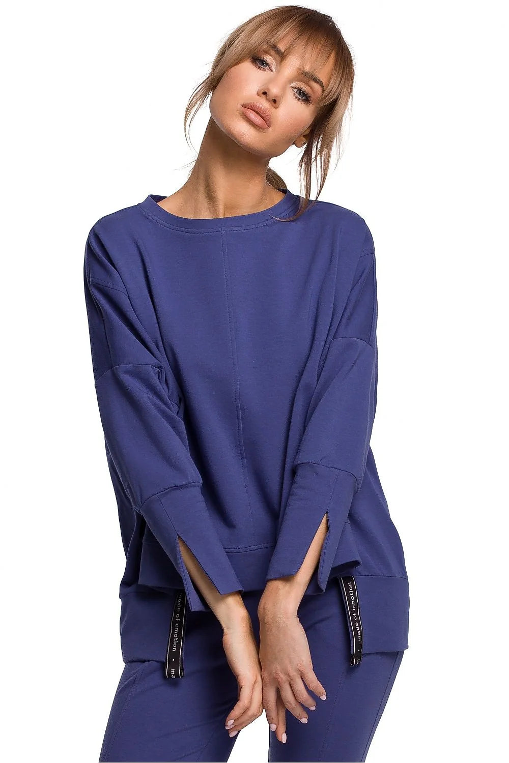 Sweatshirt ample coton noir moderne confortable manches longues fentes poignets pour femme décontractée élégante