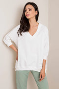 sweat oversize femme blanc col V profond longueur hanches manches trois quarts tombantes molletonnée jersey poignets côtelés fentes latérales superposable