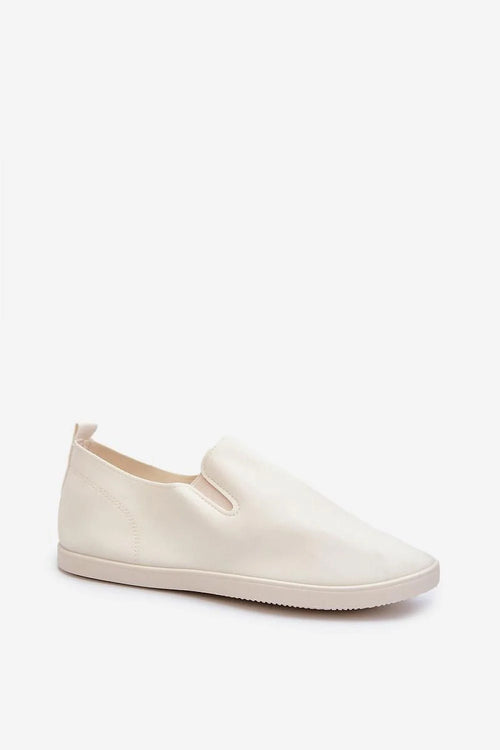 baskets femmes slipon blanches basses cuir synthétique minimalistes confortables élastiques latéraux semelle textile légère bout rond silhouette épurée urbaine