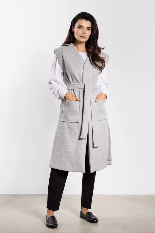 gilet long femme flanelle gris clair manches absentes ceinture nouée grandes poches plaquées fentes latérales épaules structurées col châle épuré