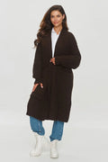 Cardigan Makadamia long oversize pour femme en maille marron foncé manches larges poignets côtelés poches latérales style décontracté hiver