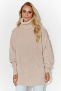 Pull féminin tricot col roulé molletonné maille serrée coupe ample manches longues coloris nude beige