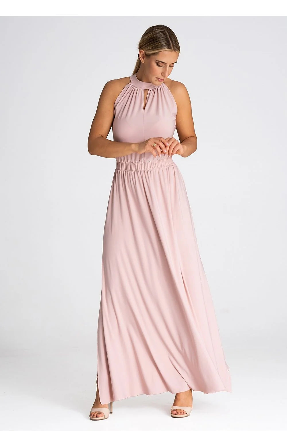 Robe de cocktail élégante longue sans manches couleur rose pâle matière fluide élastique à la taille fente latérale idéale pour soirées élégantes