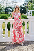 Robe longue bohème chic imprimé abstrait rose et blanc tissu mousseline décolleté V dos nu ceinture intégrée occasion estivale femme