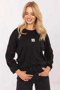 col rond manches longues coupe décontractée oversize noir uni petit logo blanc poitrine côtelés molletonné doux