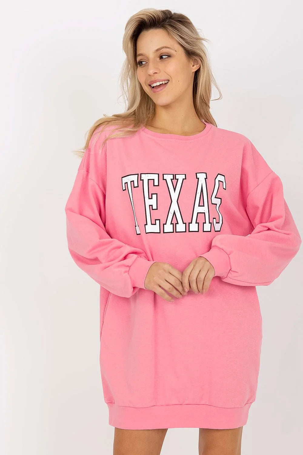 sweatshirt oversize rose bonbon coupe longue robe sweat col rond imprimé TEXAS blanc contour noir manches bouffantes poignets côtelés poches