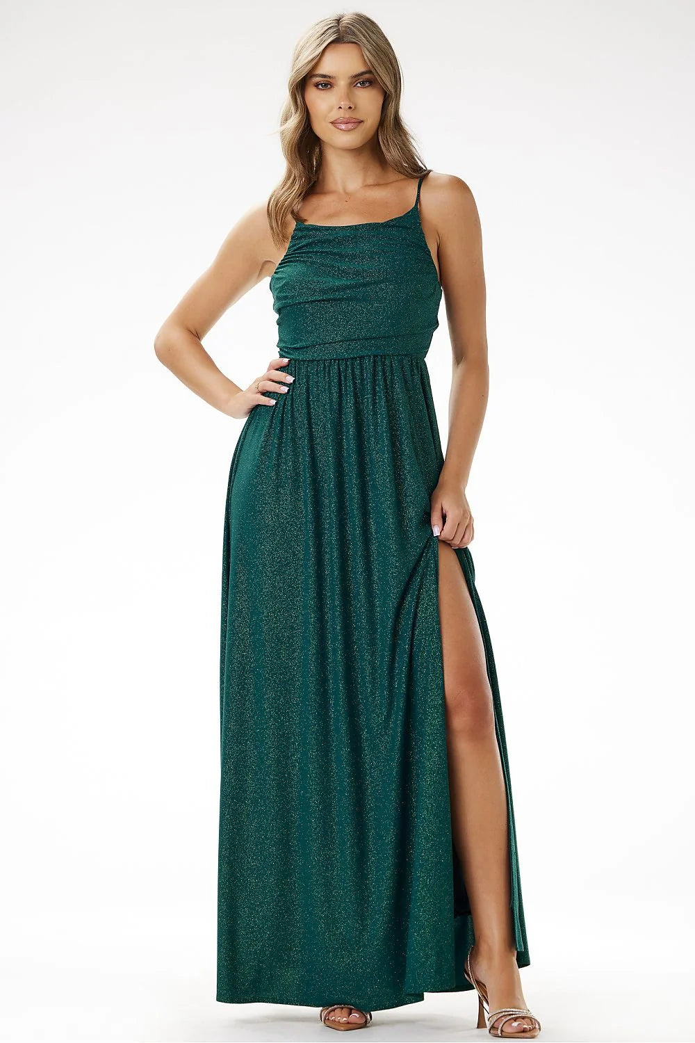 Robe de soirée longue évasée vert émeraude fente latérale finitions métalliques Jersey bretelles fines taille cintrée femme élégance moderne