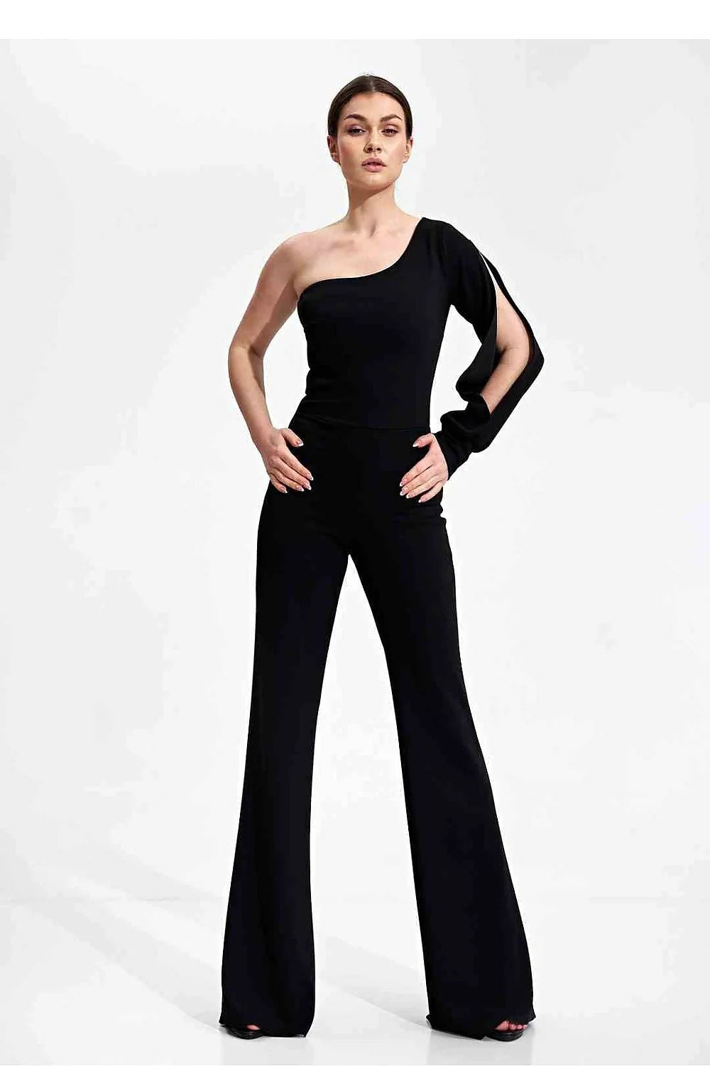 Combinaison élégante asymétrique longue épaule nue matière stretch noire femme soirée événement taille ajustable
