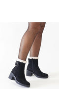 bottes suédine noire fourrure blanche talon carré moyen bout amande cheville ajustée semelle crantée antidérapante élégante