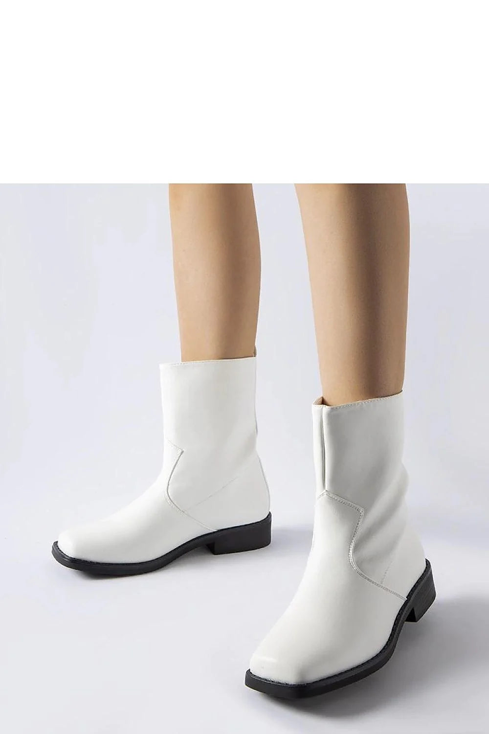 bottes solea femme minimaliste similicuir blanc semelle caoutchouc noir talon bas carré 3cm coupe ajustée discrètes enfilage sans lacets intemporel