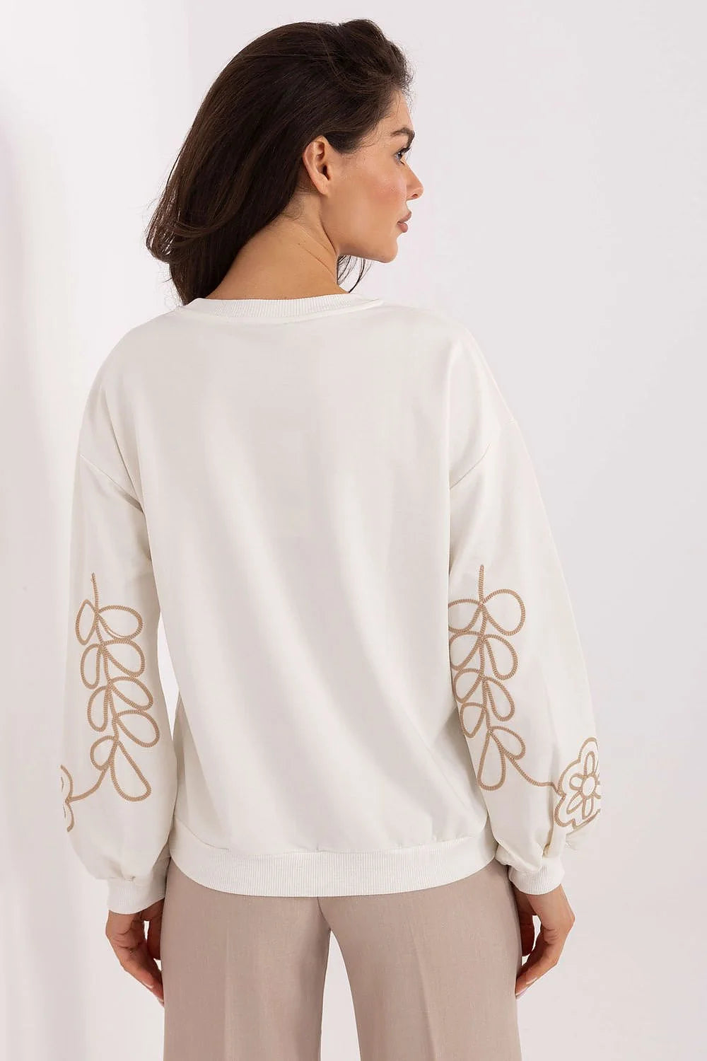sweatshirt femme oversize crème col rond manches ballon poignets côtelés base côtelée maille douce molletonnée broderie cordon beige florale confortable