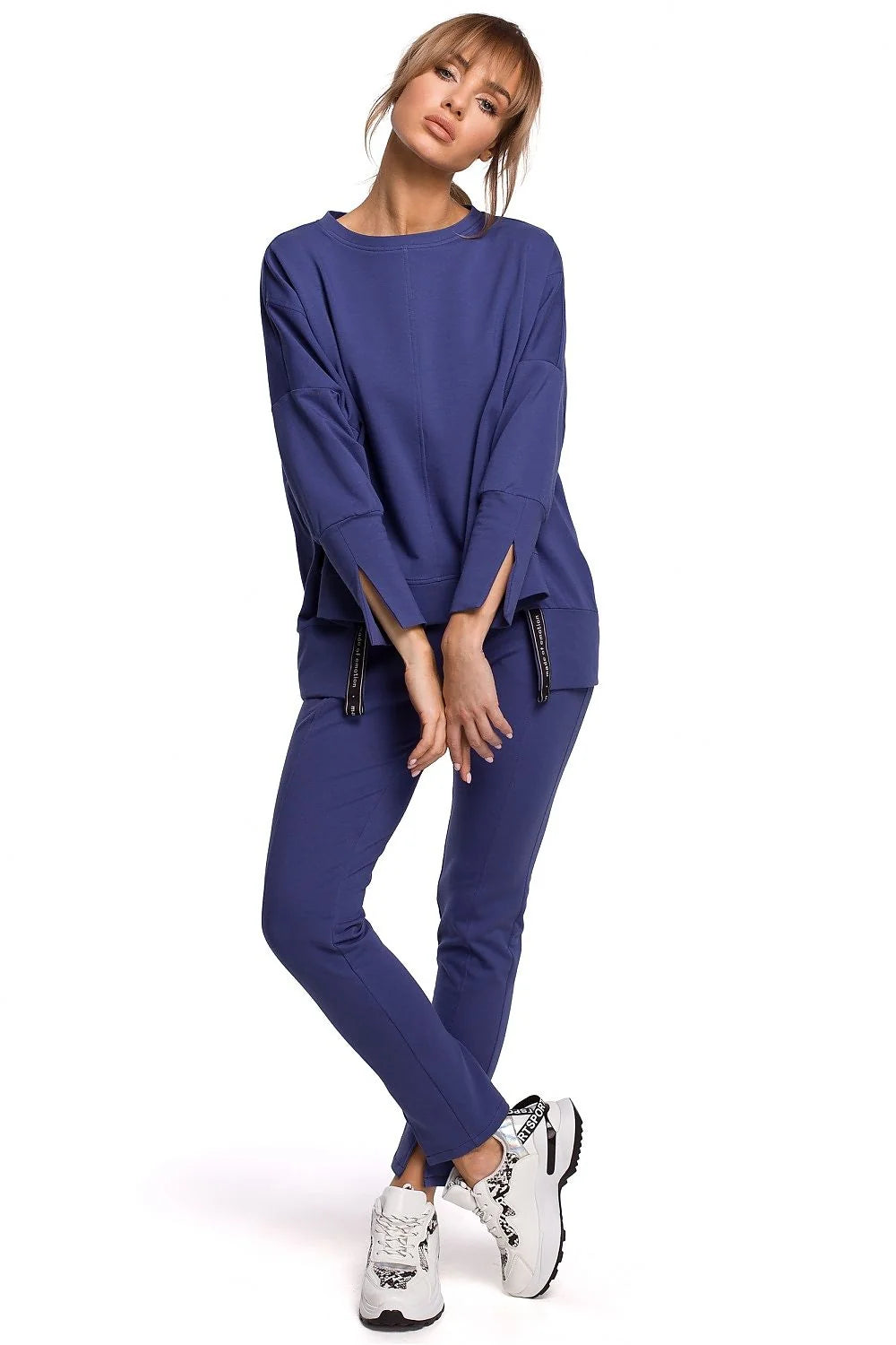 Sweatshirt ample coton noir moderne confortable manches longues fentes poignets pour femme décontractée élégante