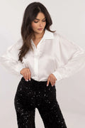 Tenue soirée élégante chemisier satin blanc pantalon sequins noir femme