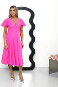 Robe de cocktail rose vif décolleté en V manches courtes en tissu structuré polyester elasthanne femme élégante occasion spéciale