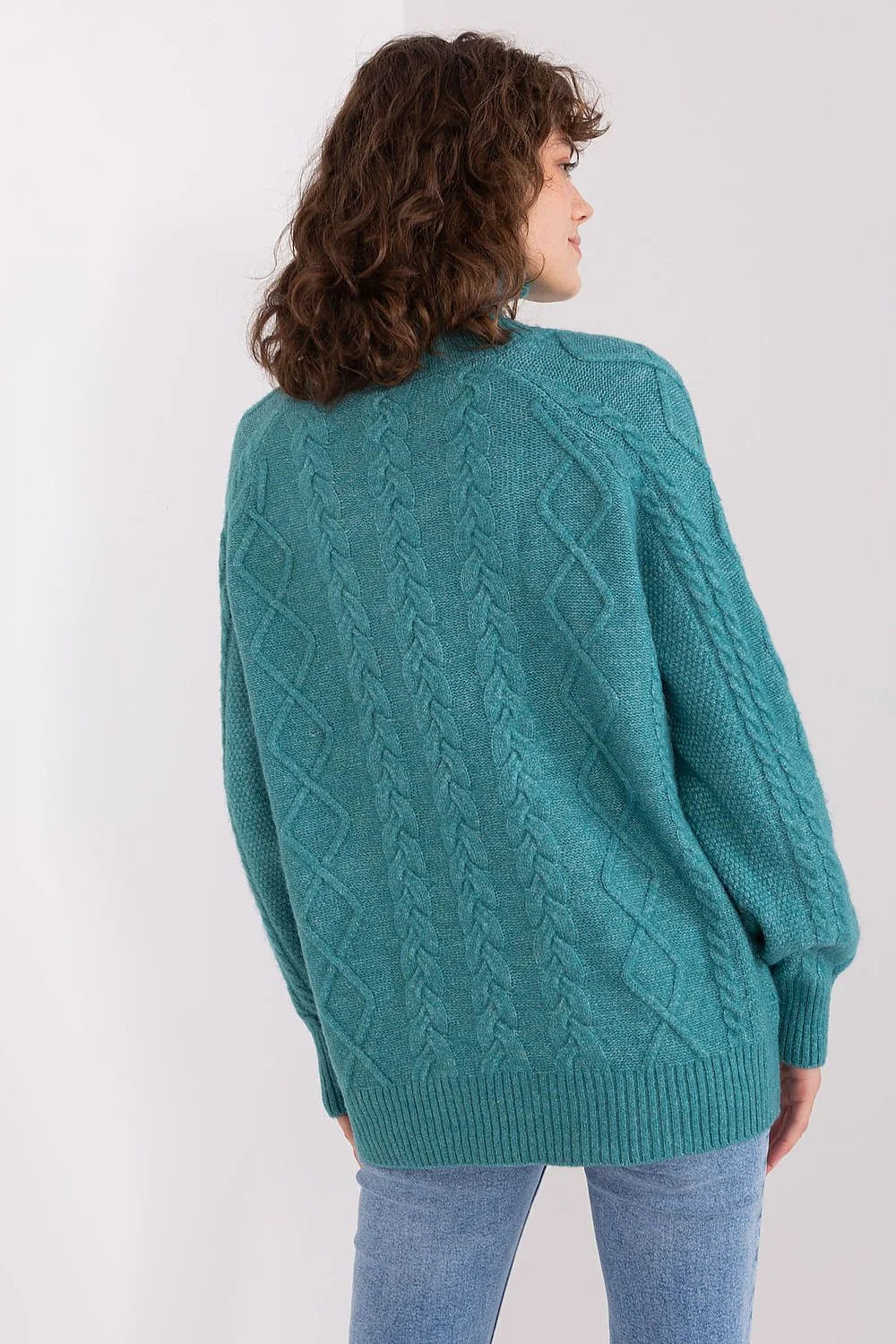 Pull femme col roulé texture tricotée motif torsadé couleur bleu canard manches longues coupe ample finitions côtelées
