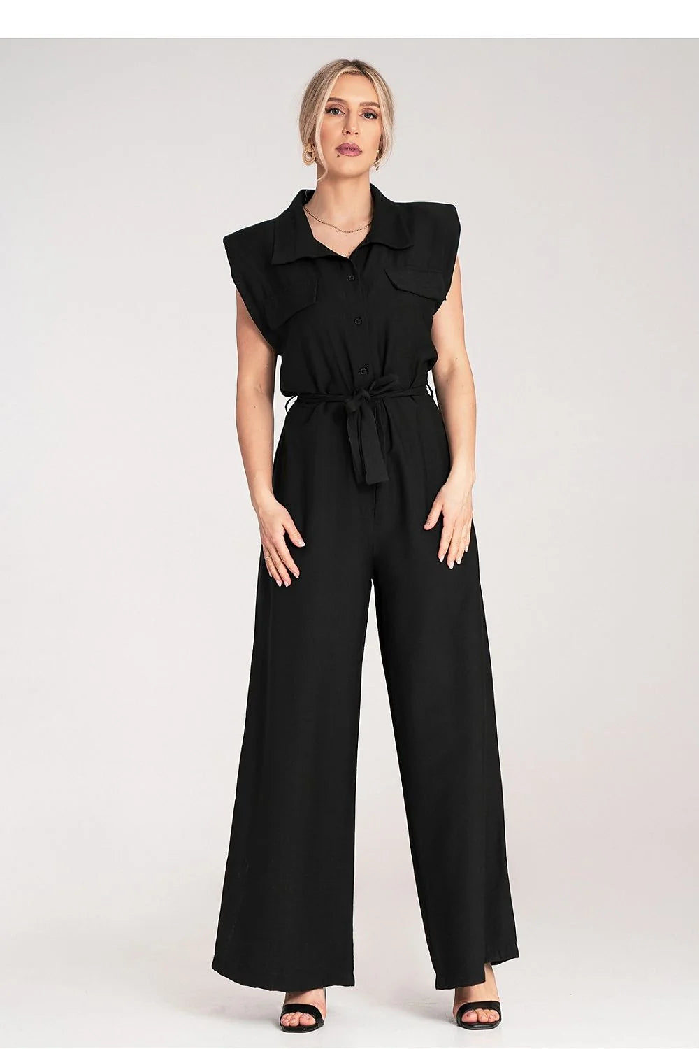 Combinaison femme élégante sans manches épaules larges ceinture nouée jambes larges matière légère couleur noire universelle