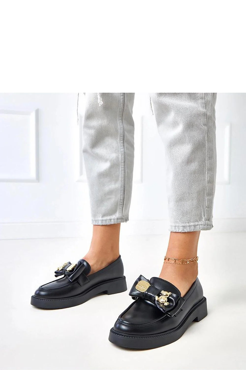 mocassins femme noir cuir écologique lisse bout rond couture semelle plateforme épaisse talon compensé confort enfilage nœud doré