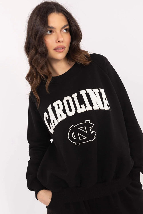 sweatshirt femme carolina logo nc noir oversize col rond molleton coton doux coupe ample manches longues bordscotes poignets broderie blanche