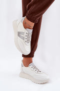 sneakers basses femme blanc cassé semelle plateforme crantée silhouette chunky cuir synthétique métallisé argenté lacets classiques col rembourré