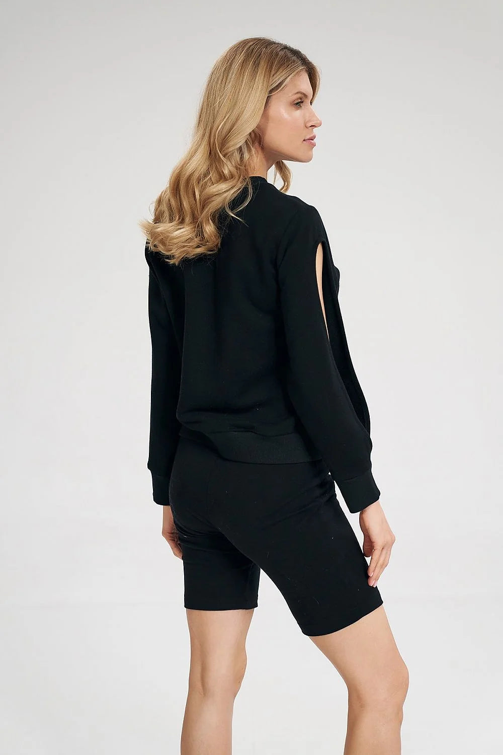 Ensemble sweatshirt et short femme noir fentes latérales athleisure modern style décontracté