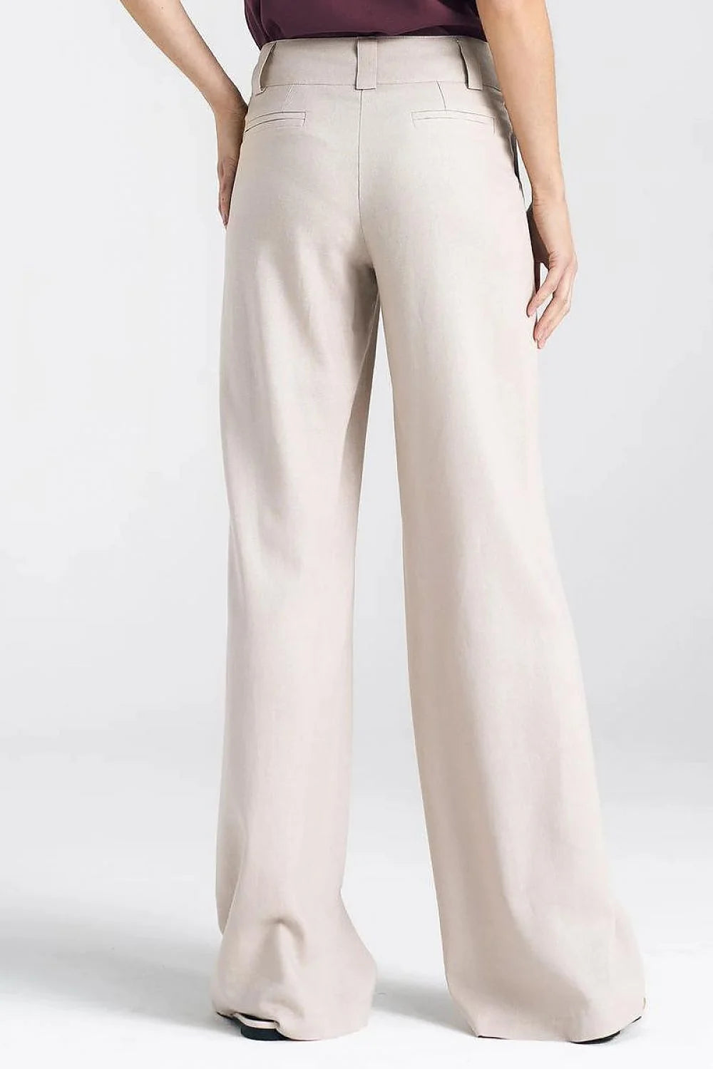 Pantalon femme élégant beige clair coupe large taille haute ceinture large poches latérales fermeture éclair boutons