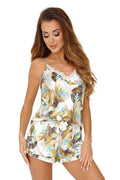 Pyjama satiné floral tropical ivoire caraco bretelles fines ajustables dentelle blanche short taille élastique noeud satin volanté soyeux