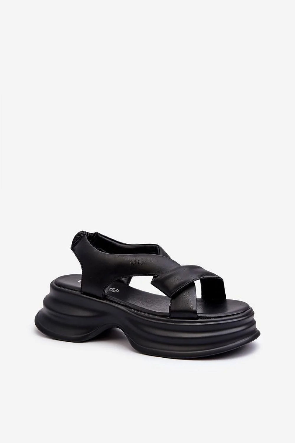 sandales cuir naturel noir design audacieux moderne contemporain semelle sculpturale ondulée plateforme45mm matelassée brides croisées ergonomique confortable urbaine sportive raffinée