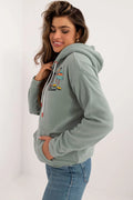 Sweatshirt Sublevel femme casual vert sauge design graphique manches longues capuche polyester fonctionnel moderne usage quotidien