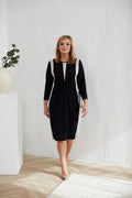 robe Aurora mi longue noire panneaux beige contrastants coupe droite légèrement cintrée taille ajustable manches longues col rond maille stretch